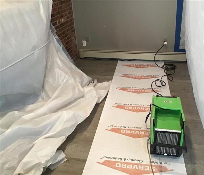 SERVPRO equipment on walking strip in room