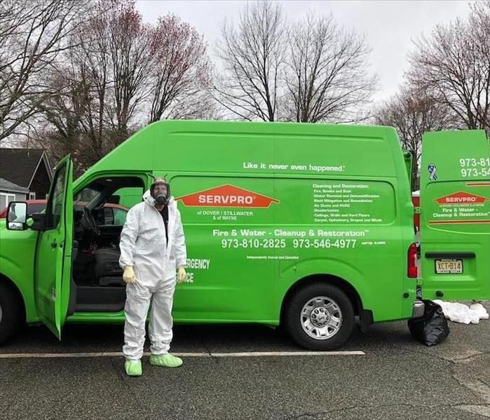 SERVPRO tech in a PPE suit ready for action.